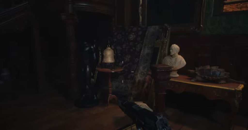 Wie man das Fünf-Glocken-Rätsel in Resident Evil Village - Bell auf dem Tisch löst